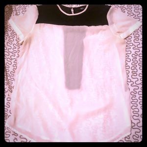 Black and white colour-blocked blouse.